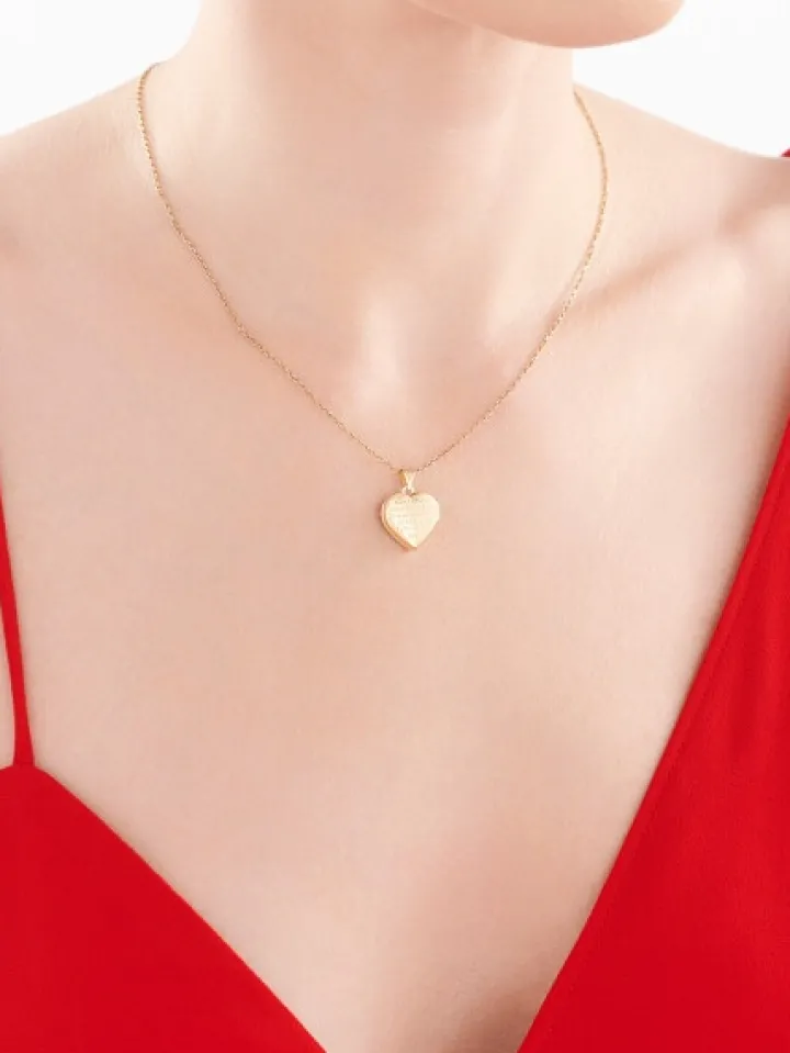 Złota zawieszka - puzderko - serce, stópki