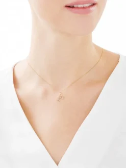 Złota zawieszka - Strzelec