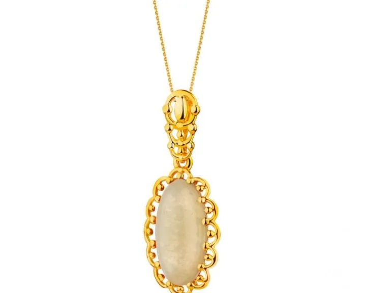 Złota zawieszka z bursztynem