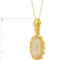 Złota zawieszka z bursztynem