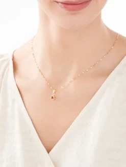 Złota zawieszka z cyrkonią