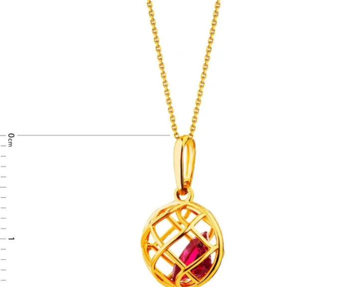 Złota zawieszka z cyrkonią