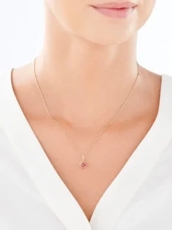 Złota zawieszka z cyrkonią