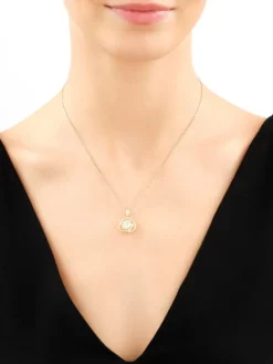 Złota zawieszka z cyrkonią