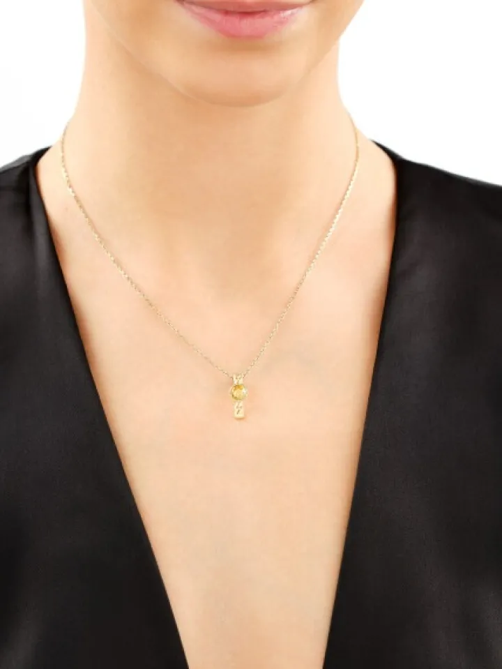 Złota zawieszka z cyrkonią