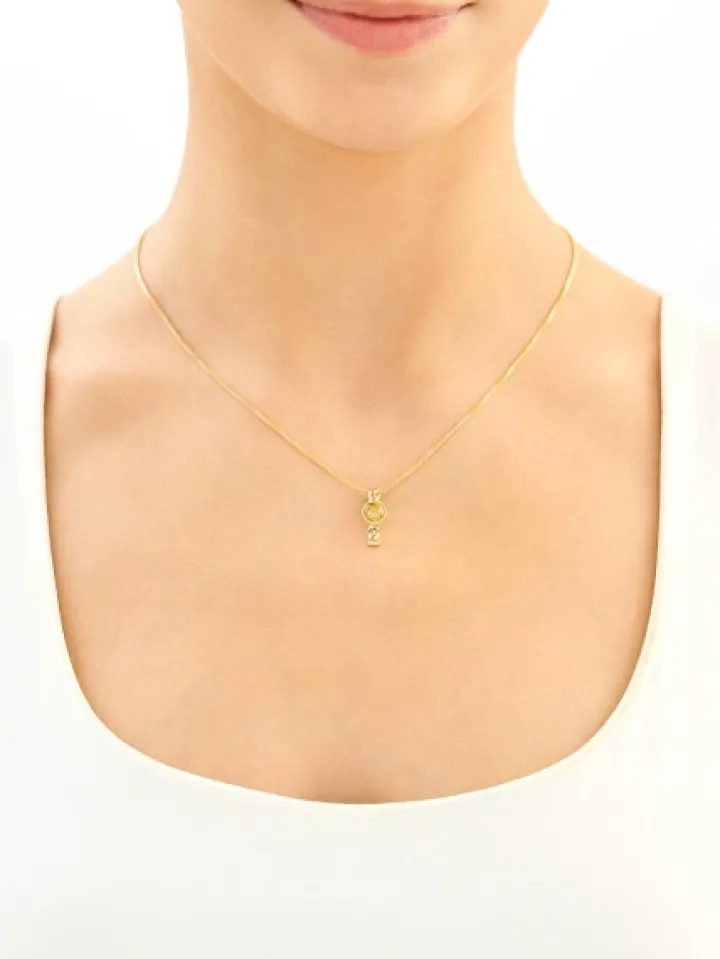 Złota zawieszka z cyrkonią