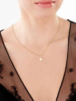 Złota zawieszka z cyrkonią