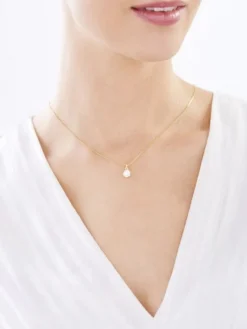 Złota zawieszka z cyrkonią