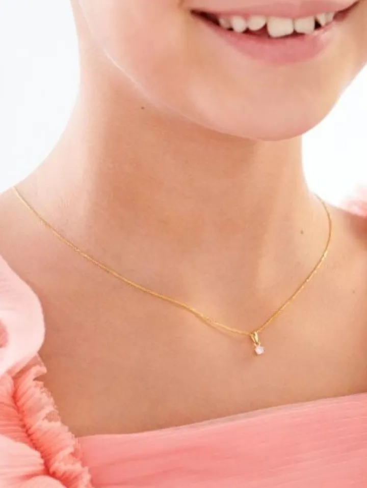 Złota zawieszka z cyrkonią