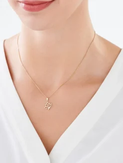 Złota zawieszka z cyrkonią