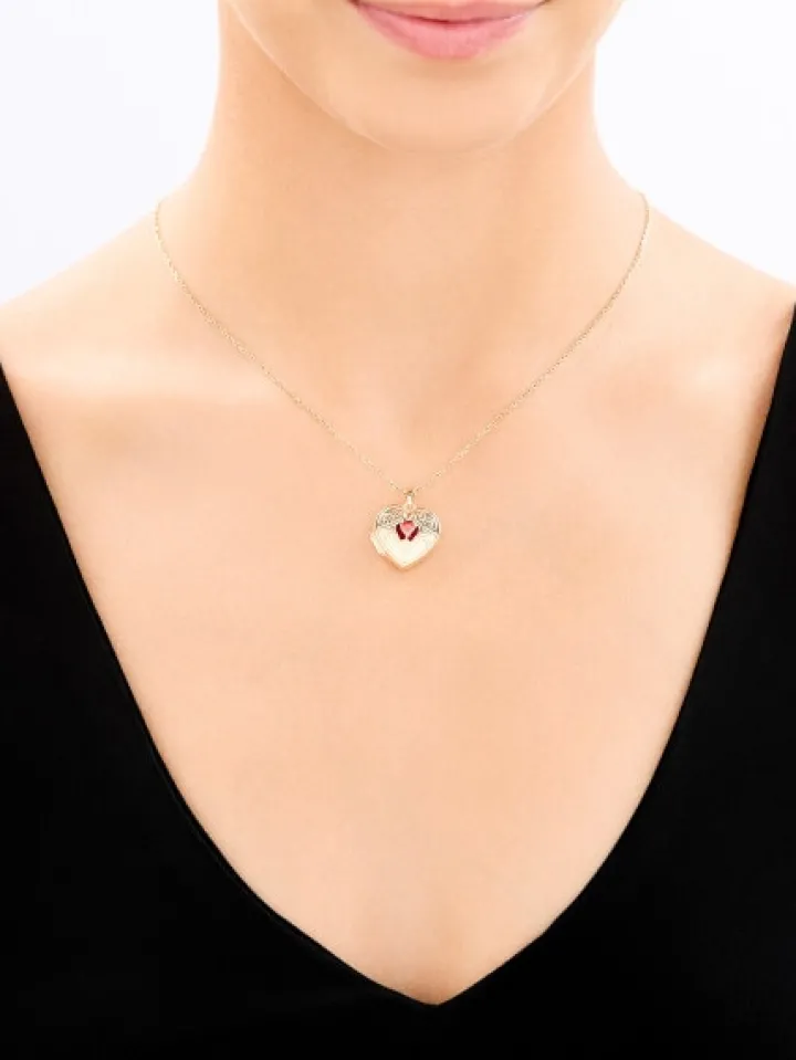 Złota zawieszka z cyrkonią - puzderko - serce