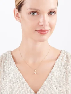 Złota zawieszka z cyrkonią i onyksem syntetycznym