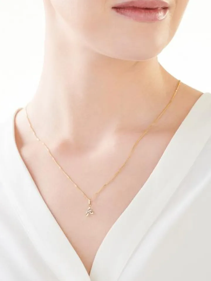 Złota zawieszka z cyrkonią - litera A