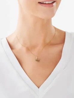 Złota zawieszka z cyrkonią - stópki