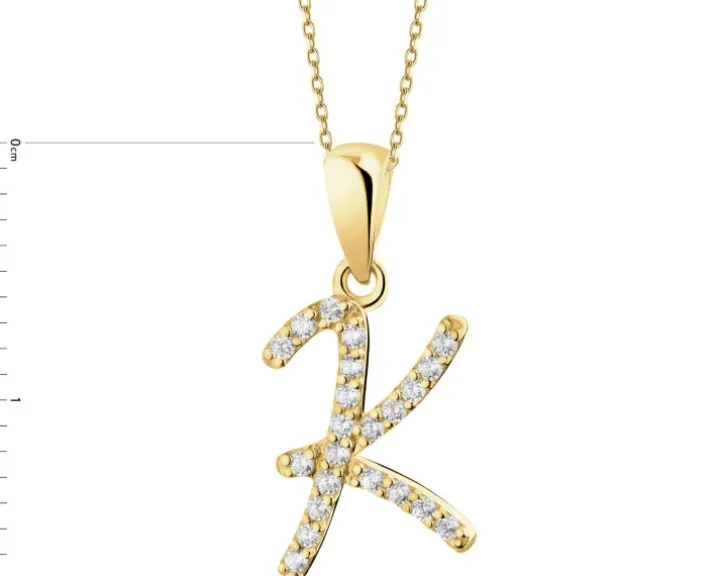 Złota zawieszka z cyrkoniami - litera K