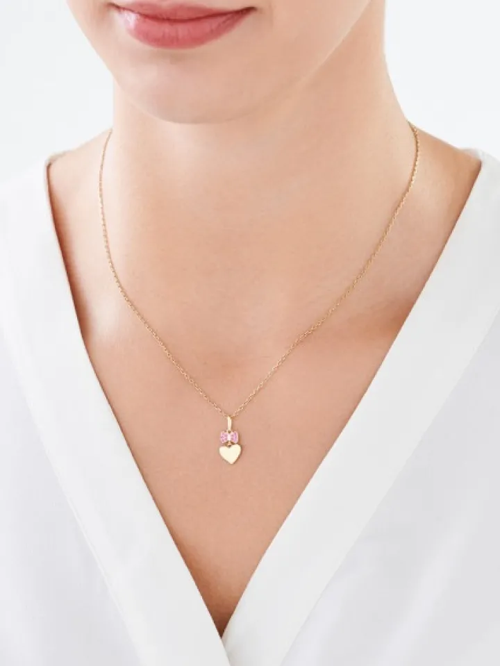 Złota zawieszka z cyrkoniami - serce, kokardka