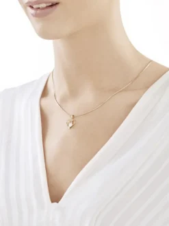 Złota zawieszka z cyrkoniami - serce