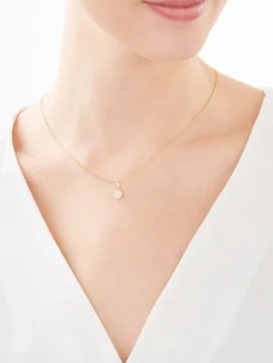 Złota zawieszka z cyrkoniami - kwiat