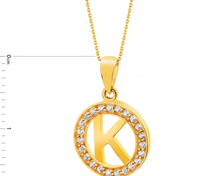 Złota zawieszka z cyrkoniami - litera K