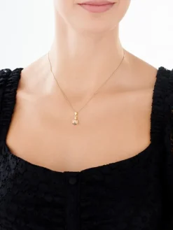 Złota zawieszka z cyrkoniami - biedronka