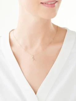 Złota zawieszka z cyrkoniami - litera A