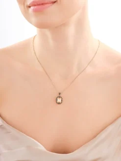 Złota zawieszka z cyrkoniami