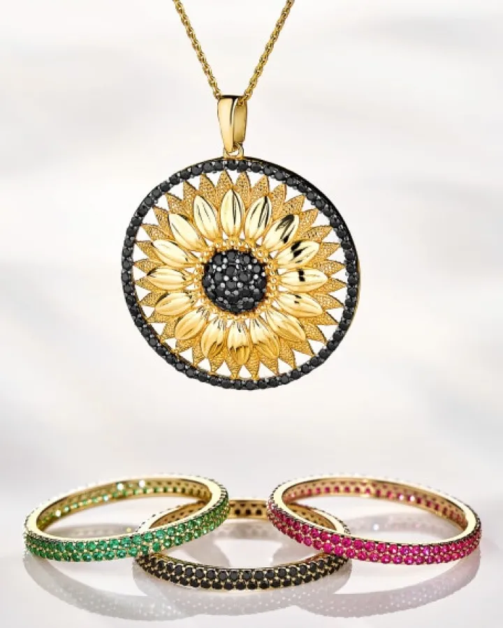 Złota zawieszka z cyrkoniami - kwiat