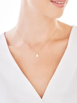 Złota zawieszka z cyrkoniami - koniczyna