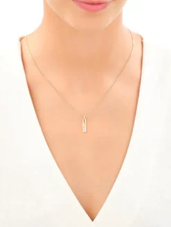 Złota zawieszka z cyrkoniami