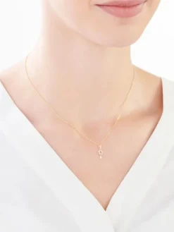 Złota zawieszka z cyrkoniami