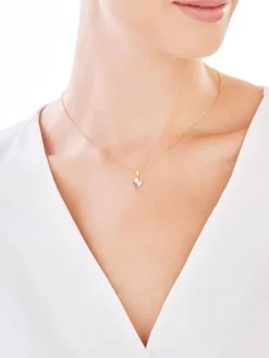 Złota zawieszka z cyrkoniami -aniołek