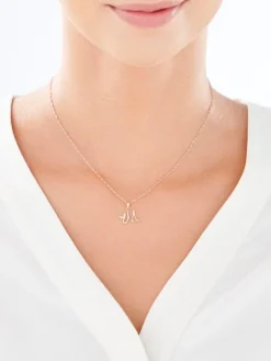 Złota zawieszka z cyrkoniami - litera M