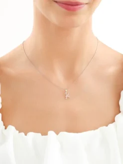 Złota zawieszka z cyrkoniami - litera K