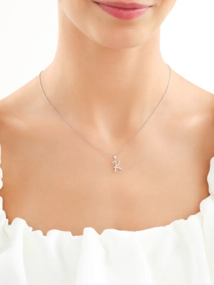 Złota zawieszka z cyrkoniami - litera K