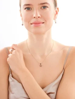 Złota zawieszka z cyrkoniami