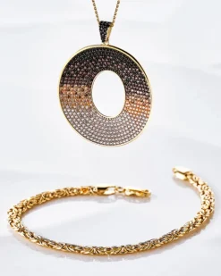 Złota zawieszka z cyrkoniami