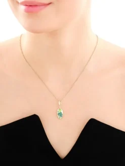 Złota zawieszka z emalią - liście monstery