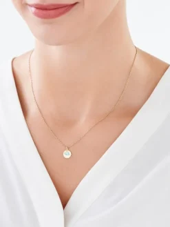 Złota zawieszka z emalią - stópki, "my baby"