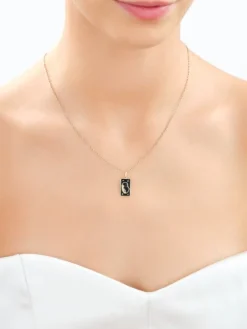 Złota zawieszka z emalią - twarz