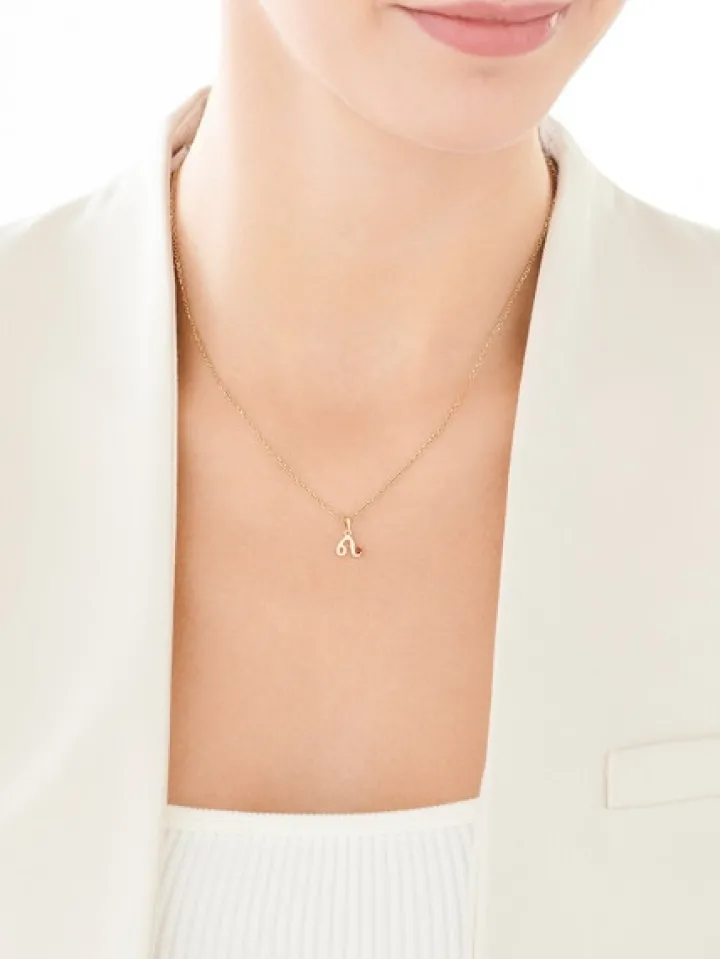 Złota zawieszka z granatem - Lew