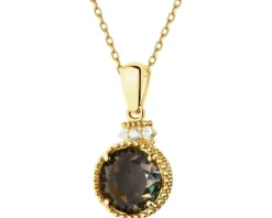 Złota zawieszka z korundem syntetycznym i cyrkoniami