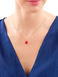 Złota zawieszka z kryształem syntetycznym