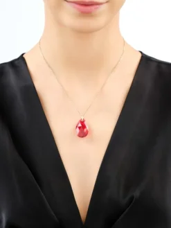 Złota zawieszka z kryształem syntetycznym