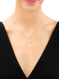 Złota zawieszka z kryształem syntetycznym