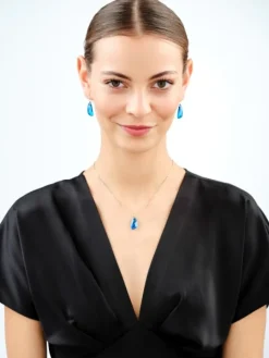 Złota zawieszka z kryształem syntetycznym