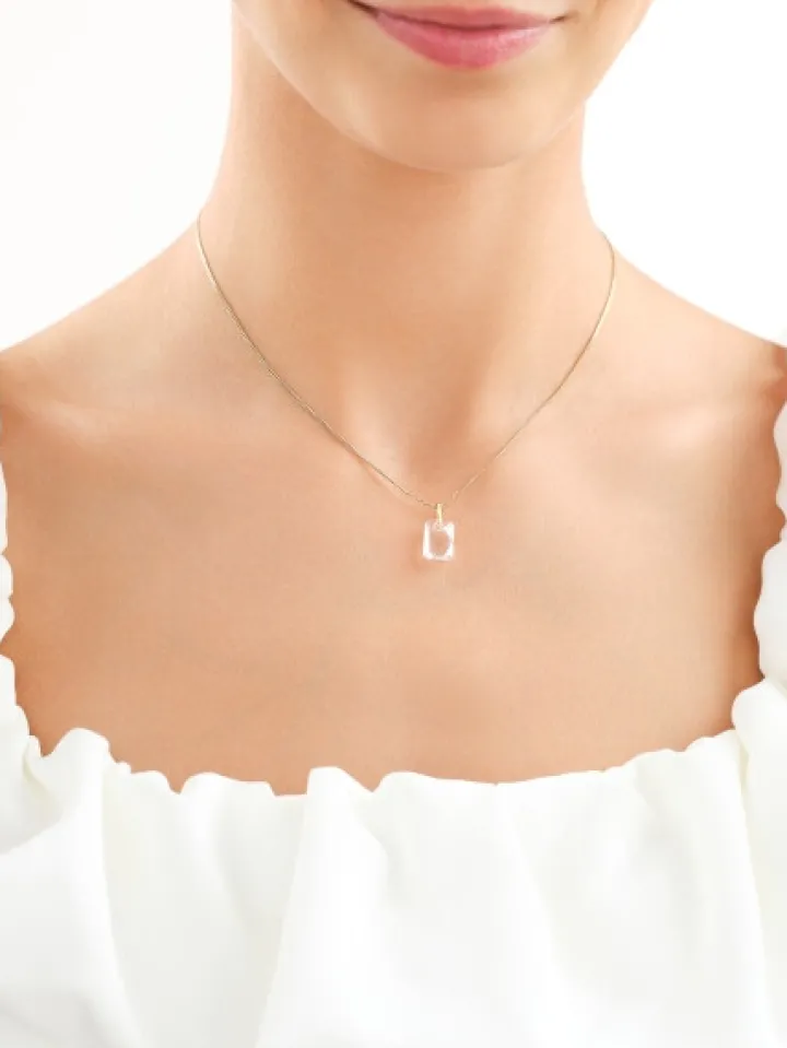 Złota zawieszka z kryształem syntetycznym