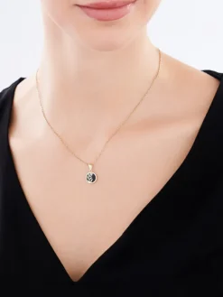 Złota zawieszka z onyksem syntetycznym - liść