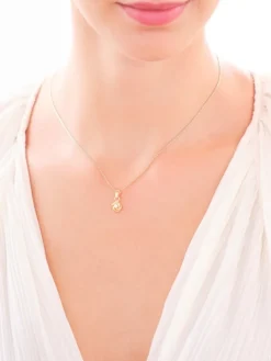 Złota zawieszka z perłą