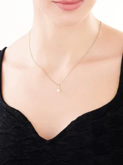 Złota zawieszka z perłą