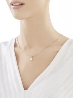 Złota zawieszka z perłą